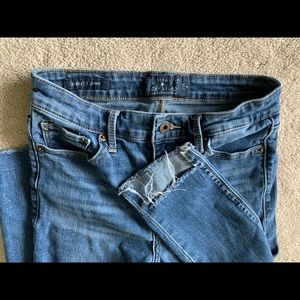 Lucky brand skinny jeans - Dark Wash Ankle Cut Jeans With Distressed Hemline